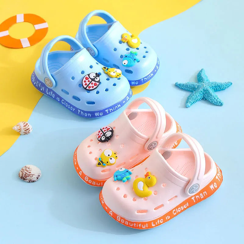 Yellow PVC kids slippers with cartoon animal print design for summer wear