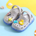 Yellow PVC kids slippers with cartoon animal print design for summer wear