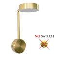 Golden square LED wall lamp with acrylic shade mounted on a wall