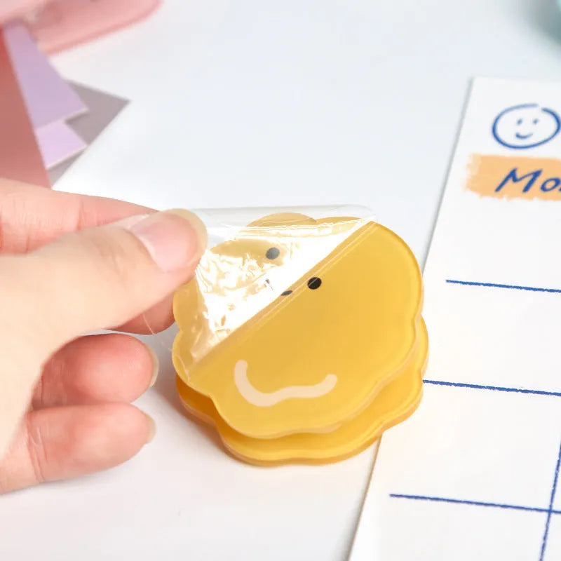 Acrylic cartoon collage clips in beige, blue, orange, and pink colours for crafts and organisation