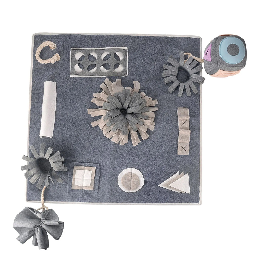 Grey cloth dog sniffing mat with two snuffle toys for mental stimulation