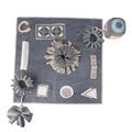 Grey cloth dog sniffing mat with two snuffle toys for mental stimulation