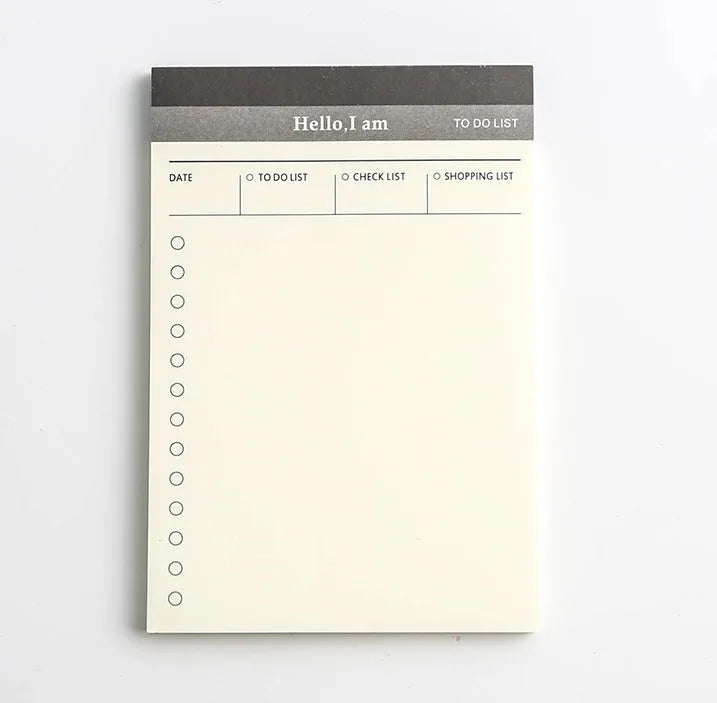 Business day planner notepad with 52 tear-off pages in paper cover, four colour options