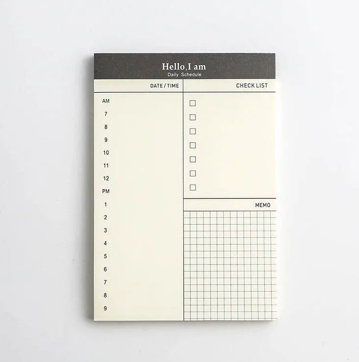 Business day planner notepad with 52 tear-off pages in paper cover, four colour options