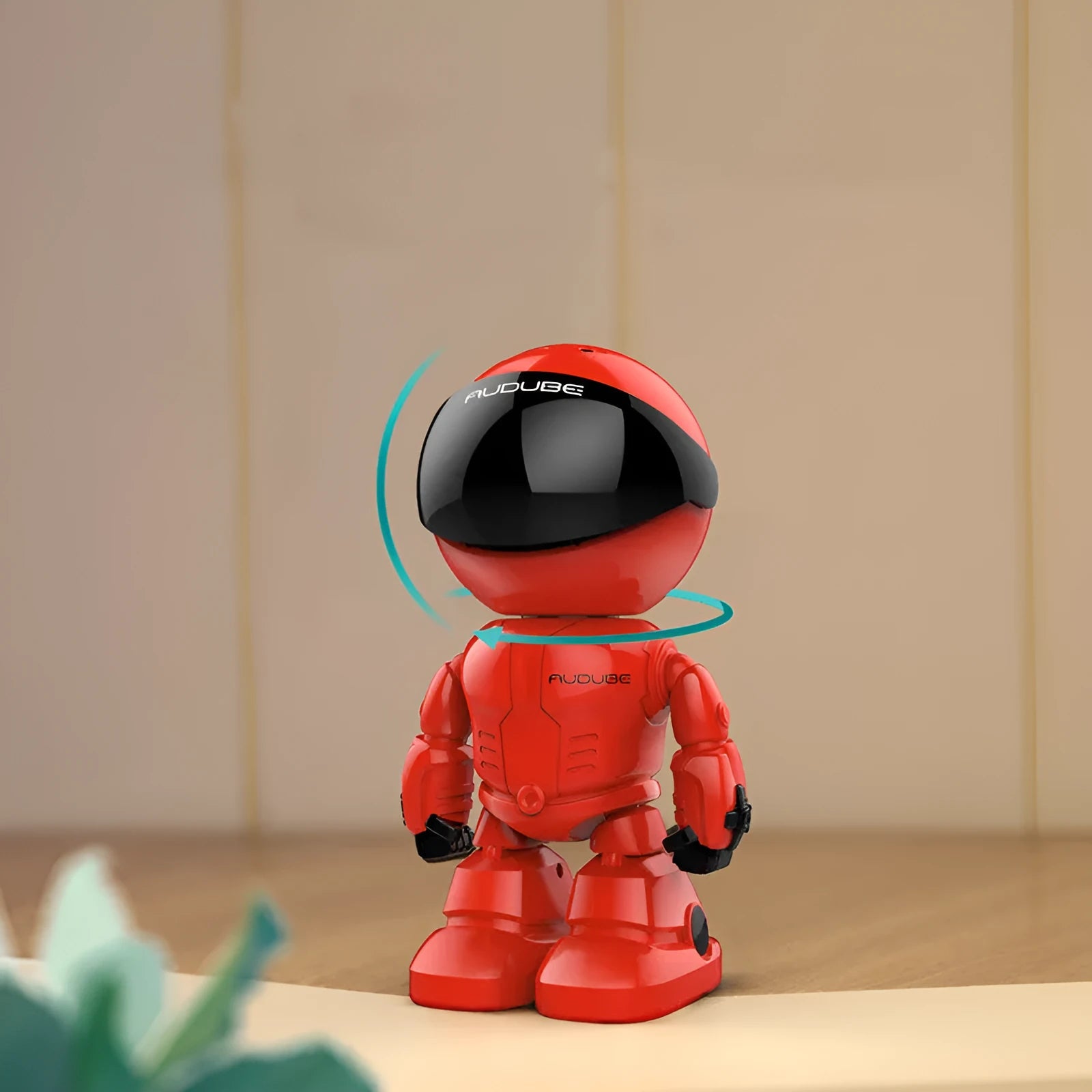 Silver remote-controlled PTZ security camera with wide-angle lens on a plastic housing.