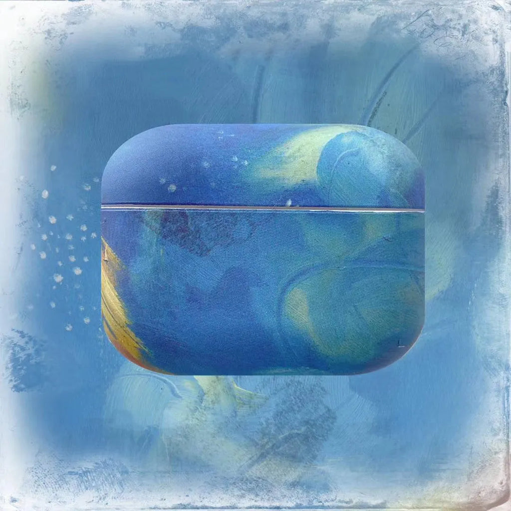 Hard plastic protective sleeve for AirPods case in a pink watercolour design, shown next to a blue watercolour version.