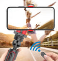 Universal aluminium smartphone tripod extended to 716mm with phone clamp holding mobile device