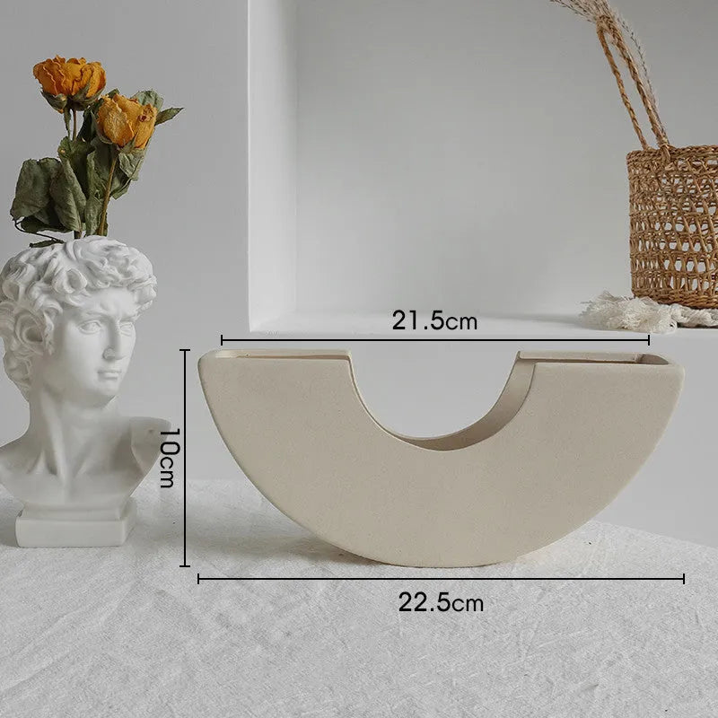 Unglazed matte ceramic dry flower vase with textured surface in Nordic style