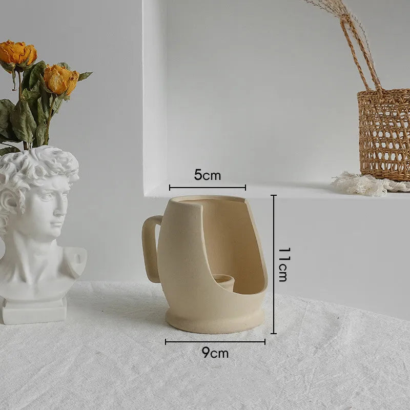 Unglazed matte ceramic dry flower vase with textured surface in Nordic style