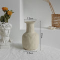 Unglazed matte ceramic dry flower vase with textured surface in Nordic style