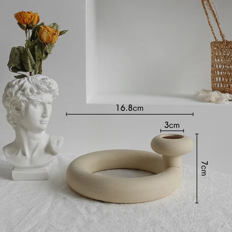 Unglazed matte ceramic dry flower vase with textured surface in Nordic style