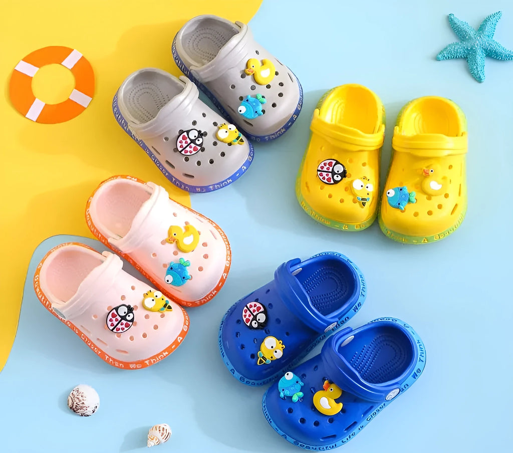 Yellow PVC kids slippers with cartoon animal print design for summer wear