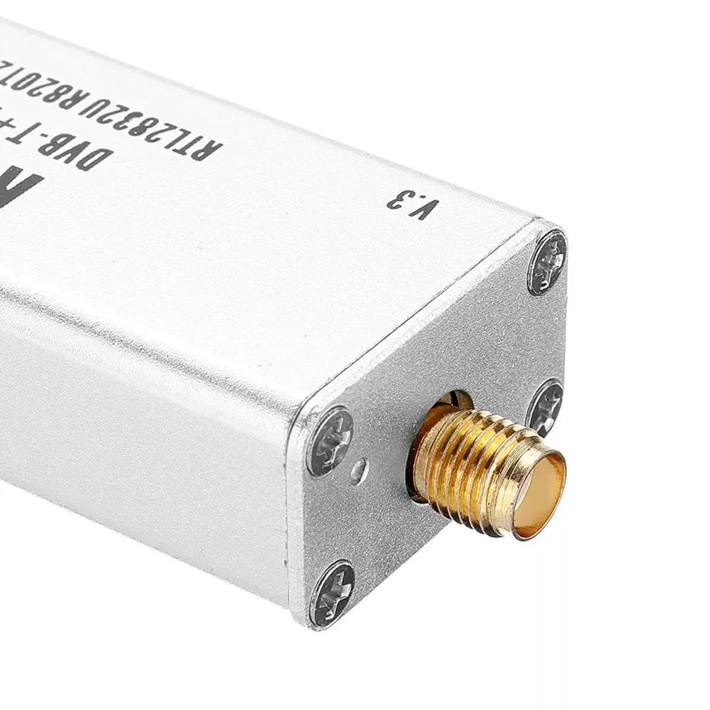 Black A300U all-band software-defined radio receiver with golden SMA connector for antenna.
