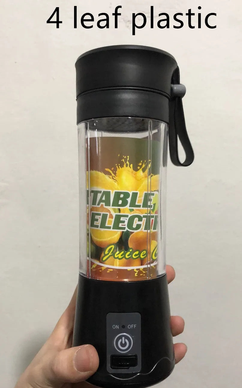Portable pink USB electric fruit juicer with stainless steel blade and carrying rope