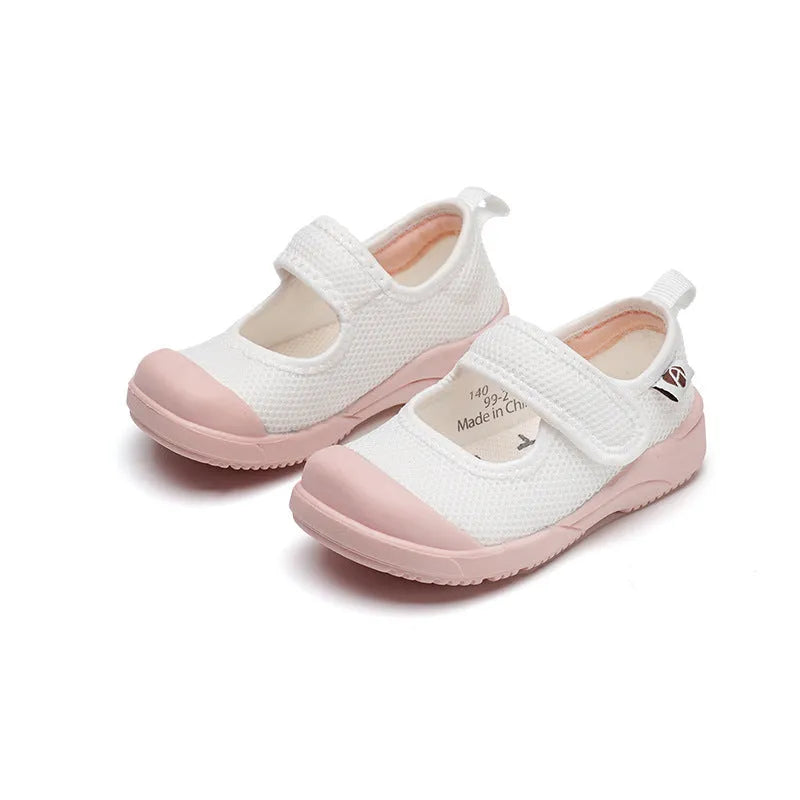White children's cloth shoes with mesh upper, velcro strap, and non-slip sole for toddlers
