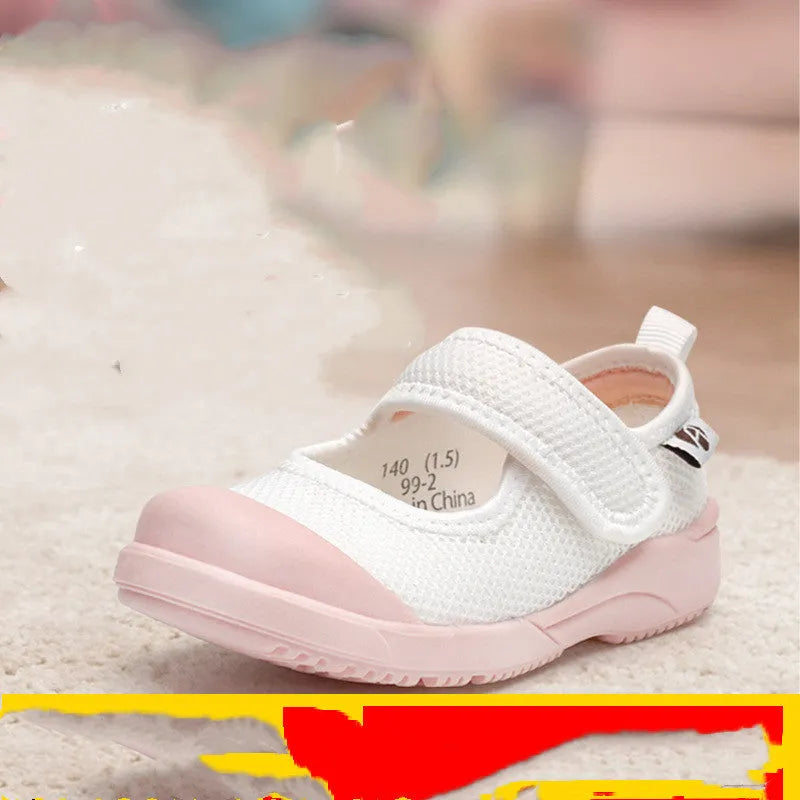 White children's cloth shoes with mesh upper, velcro strap, and non-slip sole for toddlers