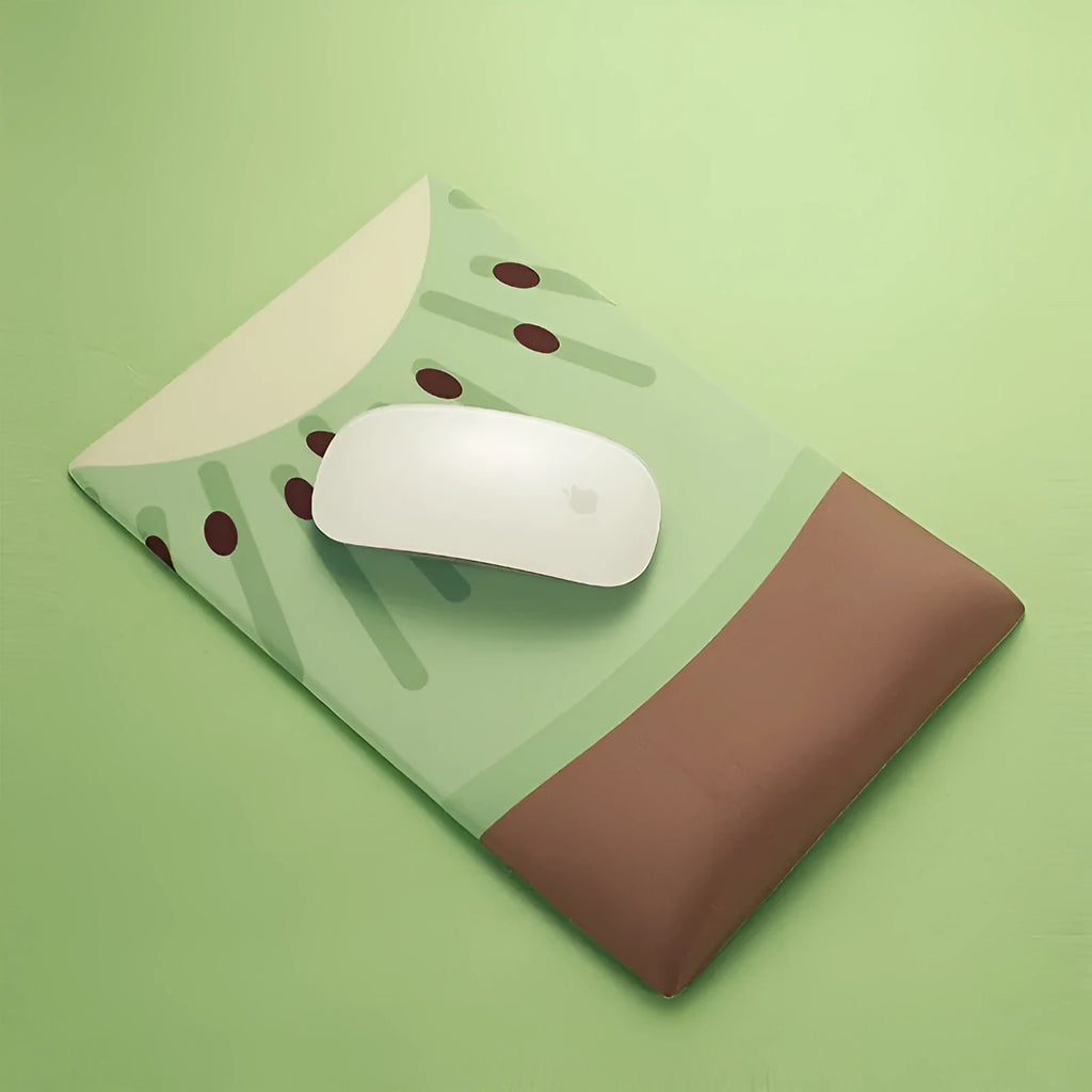 Green kiwi fruit design on a cloth mouse pad with a thick, integrated silicone wrist support cushion.