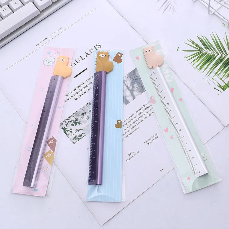 Colourful aluminium ruler showing 30 cm scale with millimetre and centimetre markings.