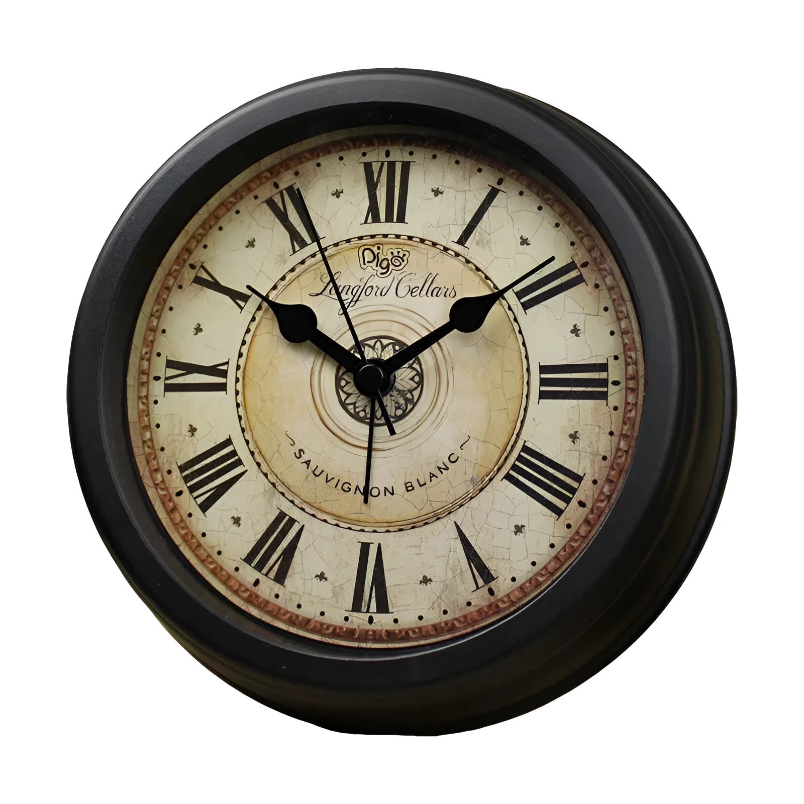 Round retro desk alarm clock with a white dial on a wooden surface.