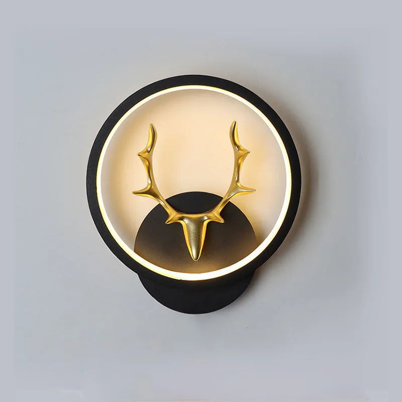 Modern deer antler design wall lamp with remote control on a plain wall, showing white and black colour options.