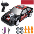 Huangbo 4WD remote control drift car in a chosen colour on a smooth surface.