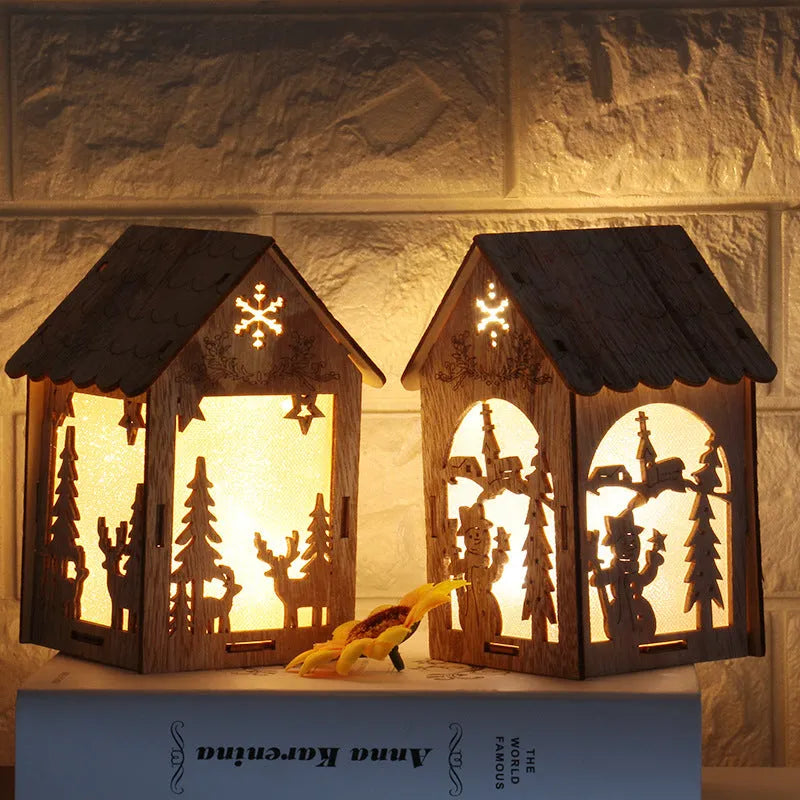 Three wooden Christmas house decorations including bell, Santa Claus and snowman designs in natural wood colour