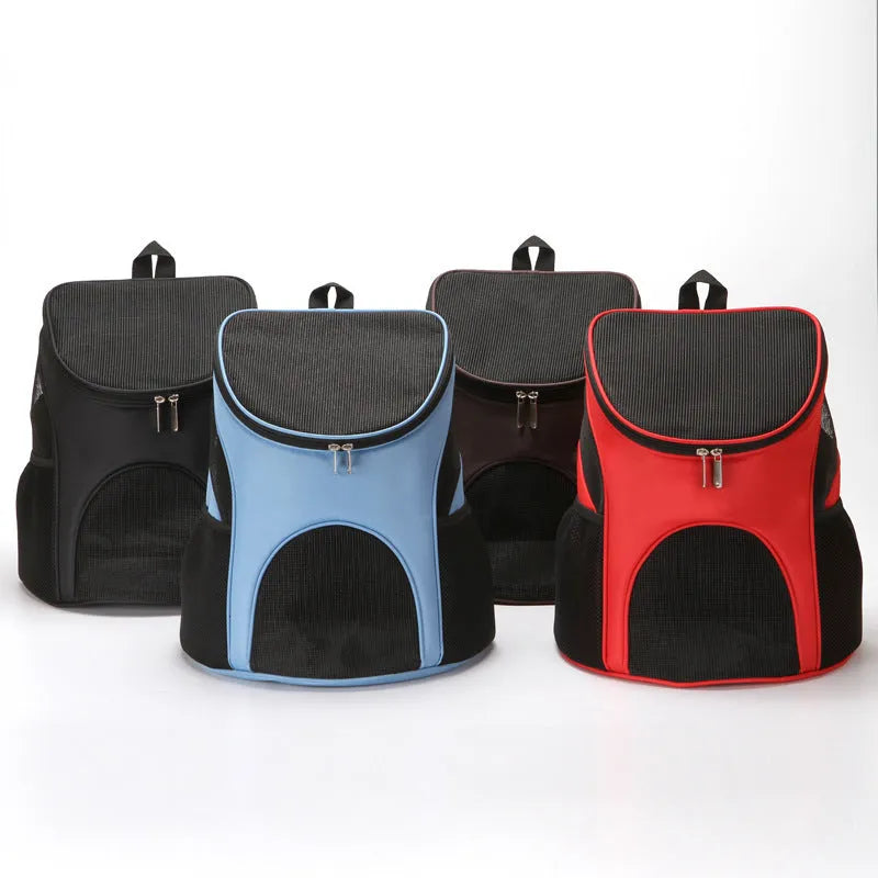 Red pet backpack carrier for a small dog, shown as a portable outing bag.
