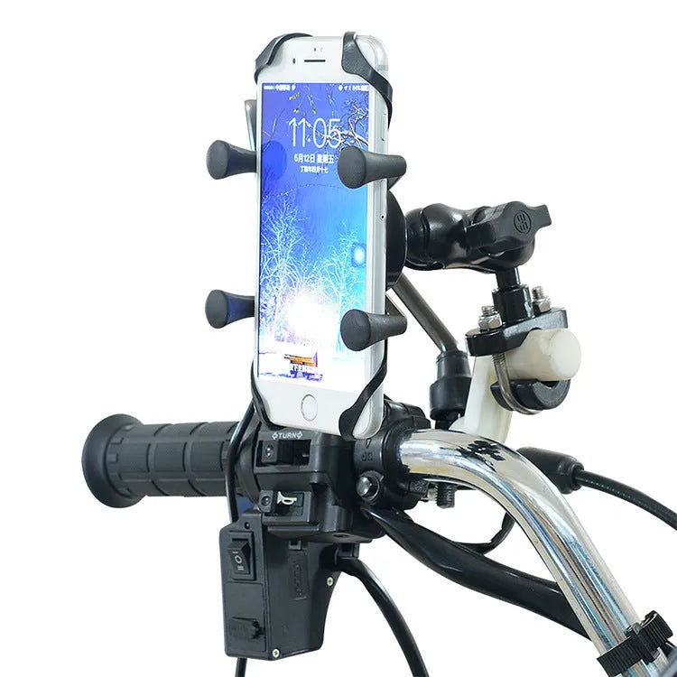 Black aluminium alloy motorcycle phone mounting bracket attached to a handlebar, holding a mobile phone.