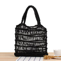 Women's woven straw shoulder bag in medium size with double straps and national style design