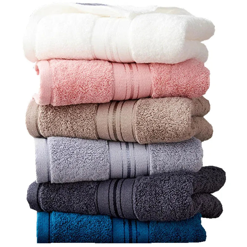 Pure cotton three-piece towel set showing bath towel, hand towel, and face cloth in blue colour