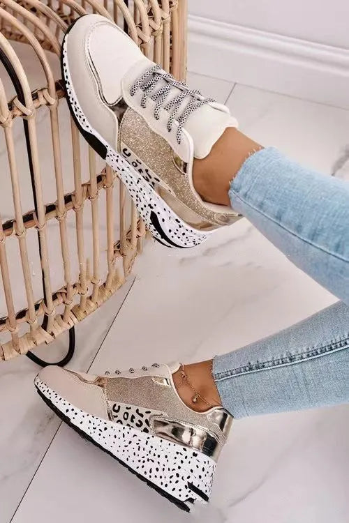 Women's suede lace-up platform sneakers with low wedge heel, round toe, colour matching upper in golden or gray