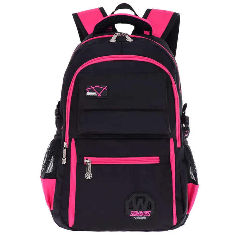 Green nylon school backpack for students with side pockets and mesh bag.