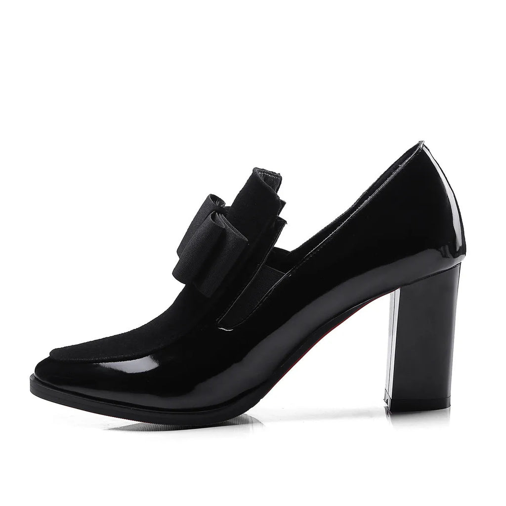 Black patent leather women's high heels with a thick 8cm heel and square toe, side view.