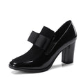 Black patent leather women's high heels with a thick 8cm heel and square toe, side view.