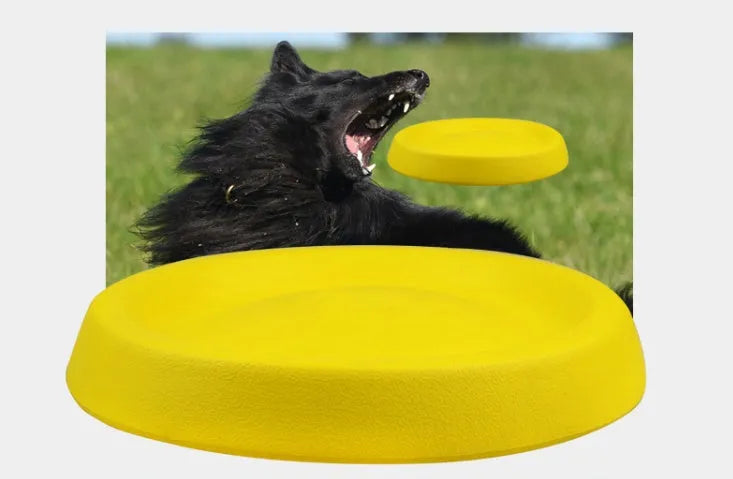 Bright yellow EVA dog throwing toy for fetch and training games.
