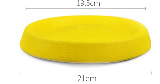 Bright yellow EVA dog throwing toy for fetch and training games.