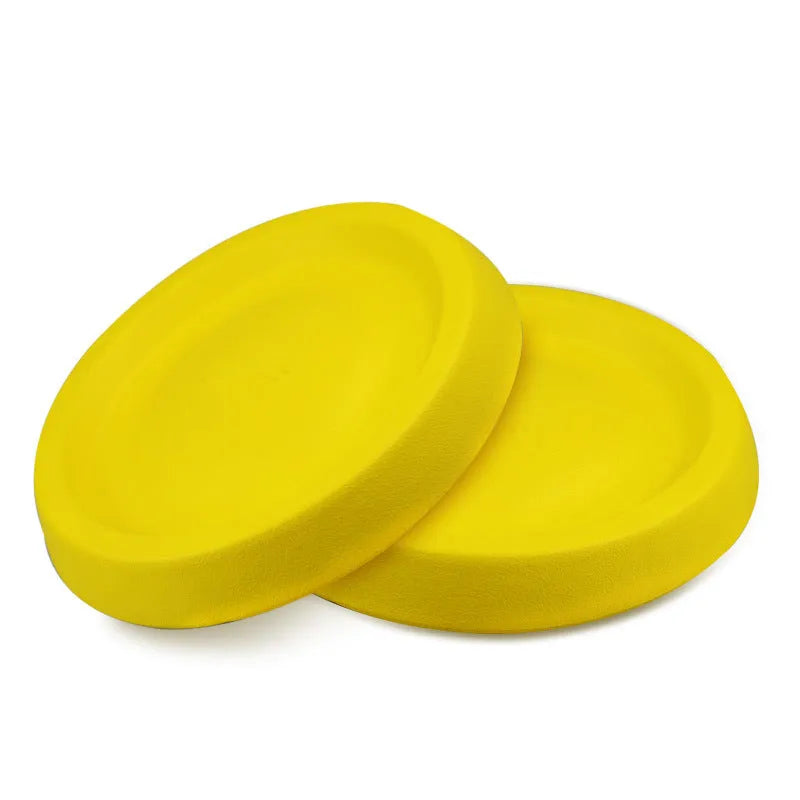Bright yellow EVA dog throwing toy for fetch and training games.