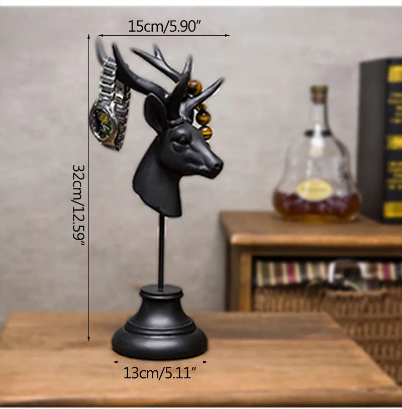 Natural resin animal sculpture home decoration in black, white, or wood colour on a wooden surface.