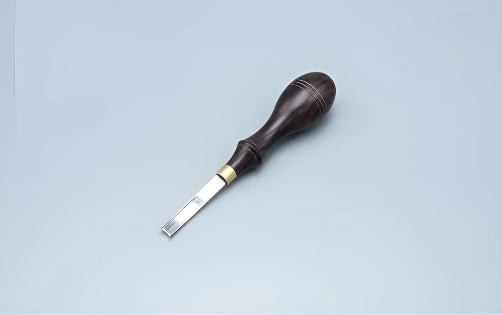 Leather thinning knife with a wide shovel edge for professional shoemaking and leatherworking.