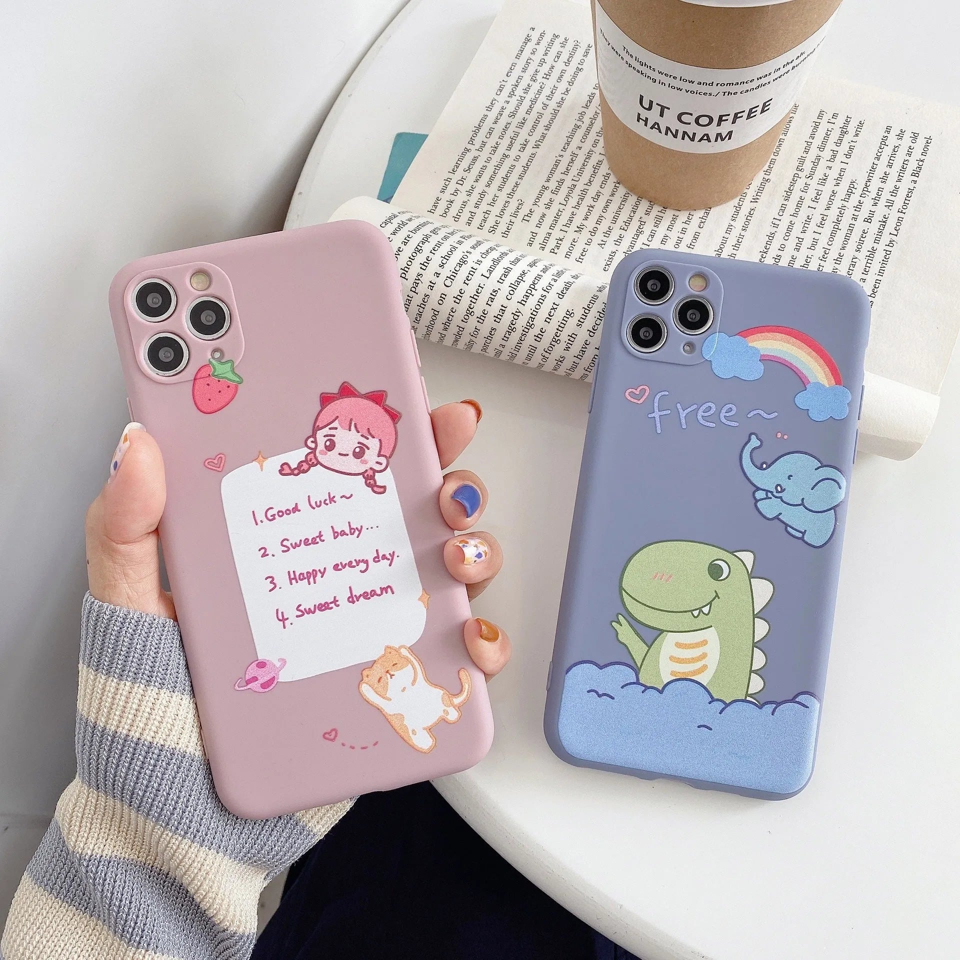 Blue TPU iPhone case with printed dinosaur cartoon design shown on iPhone 12 mini