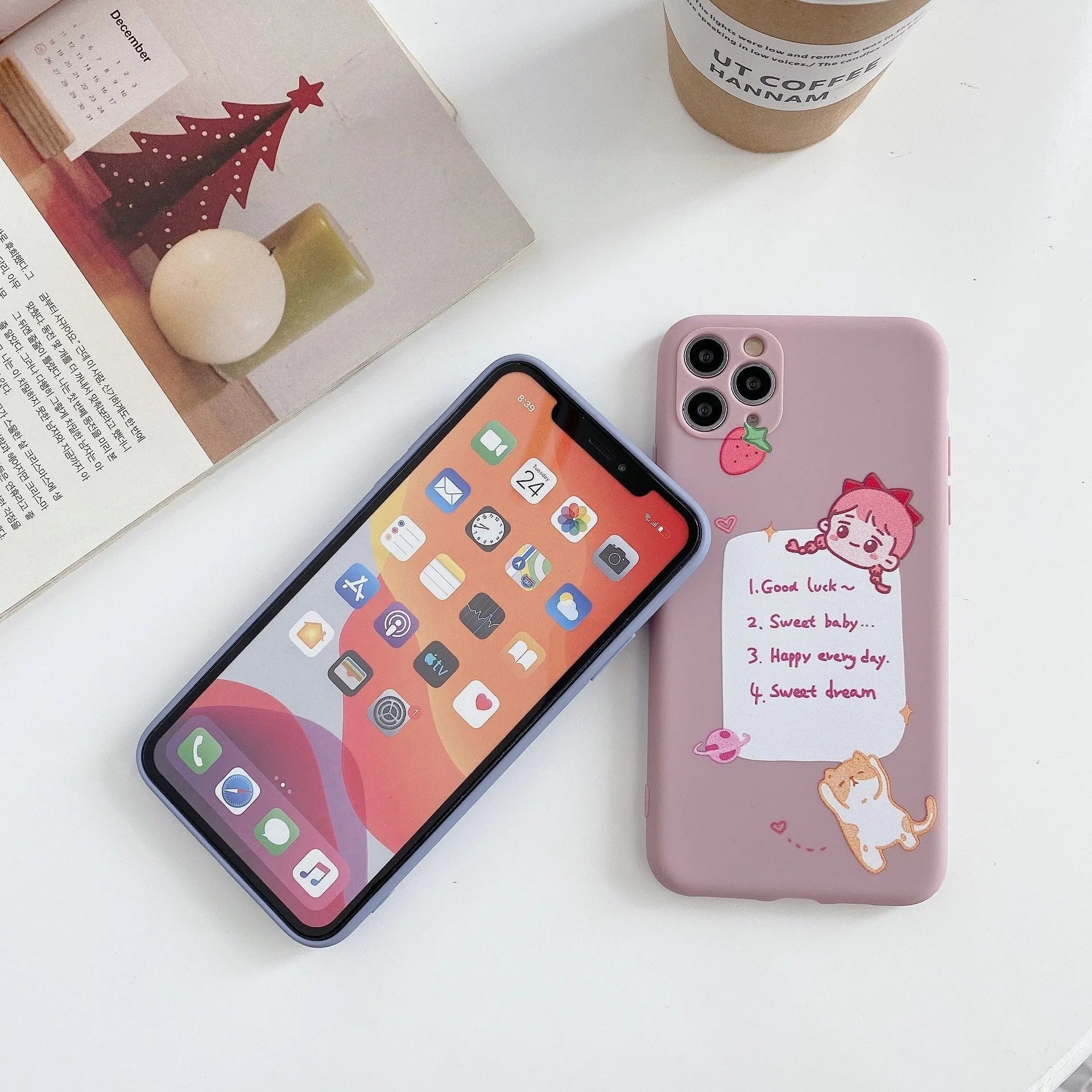 Blue TPU iPhone case with printed dinosaur cartoon design shown on iPhone 12 mini