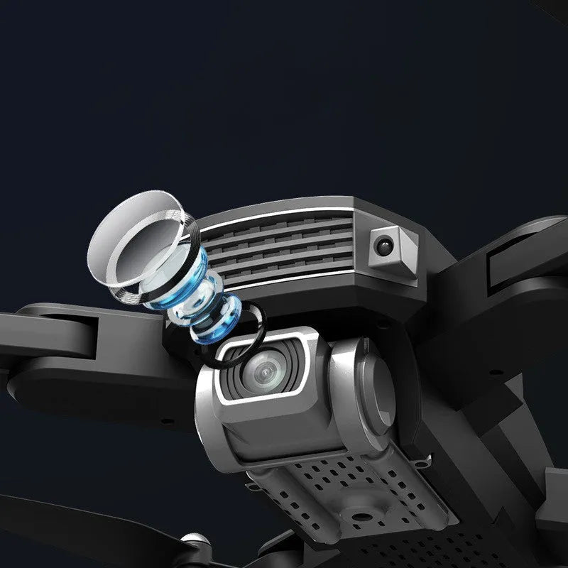 Black and red folding quadrocopter children's toy with 4K camera on a grassy field.