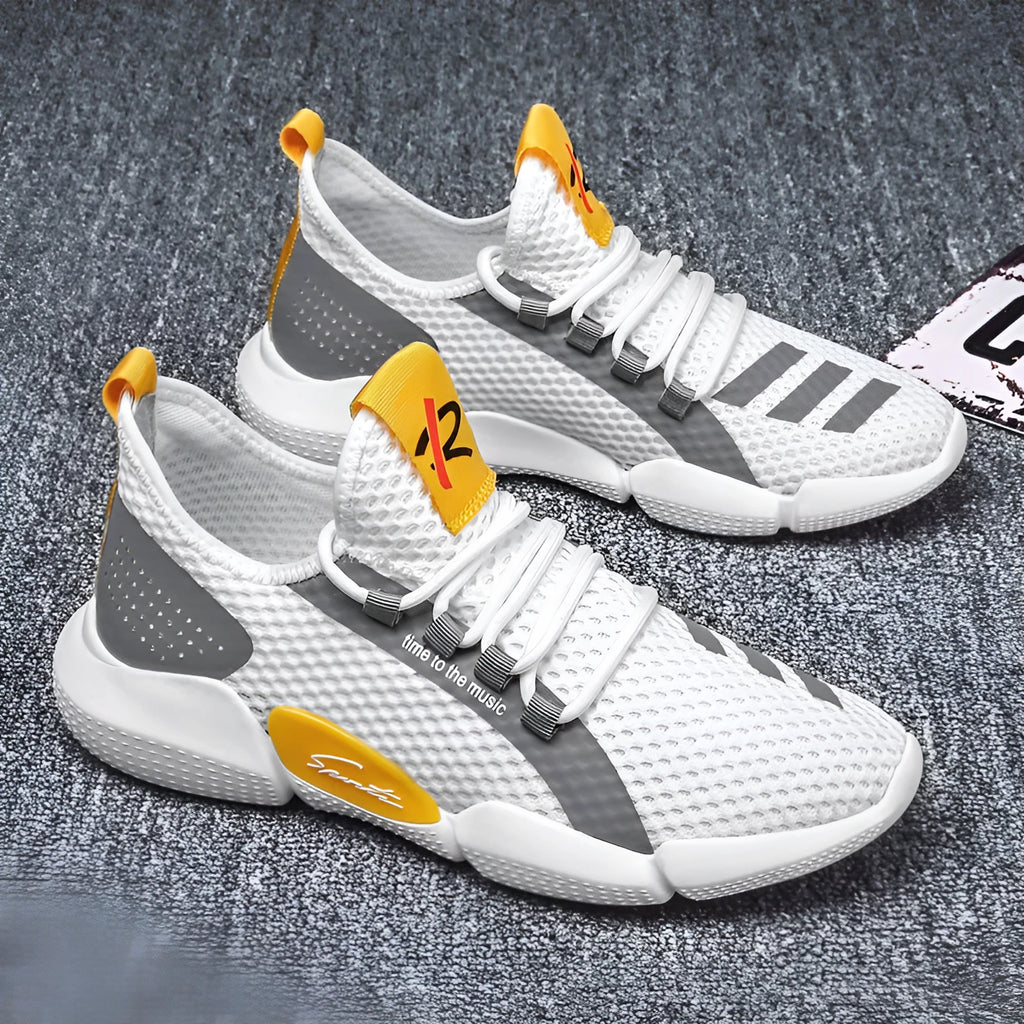 Men's summer mesh low top sneakers in white with rubber sole and lace-up closure