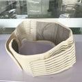 Black self-heating magnetic waist protection belt laid flat, showing its elastic cloth material and fastener.