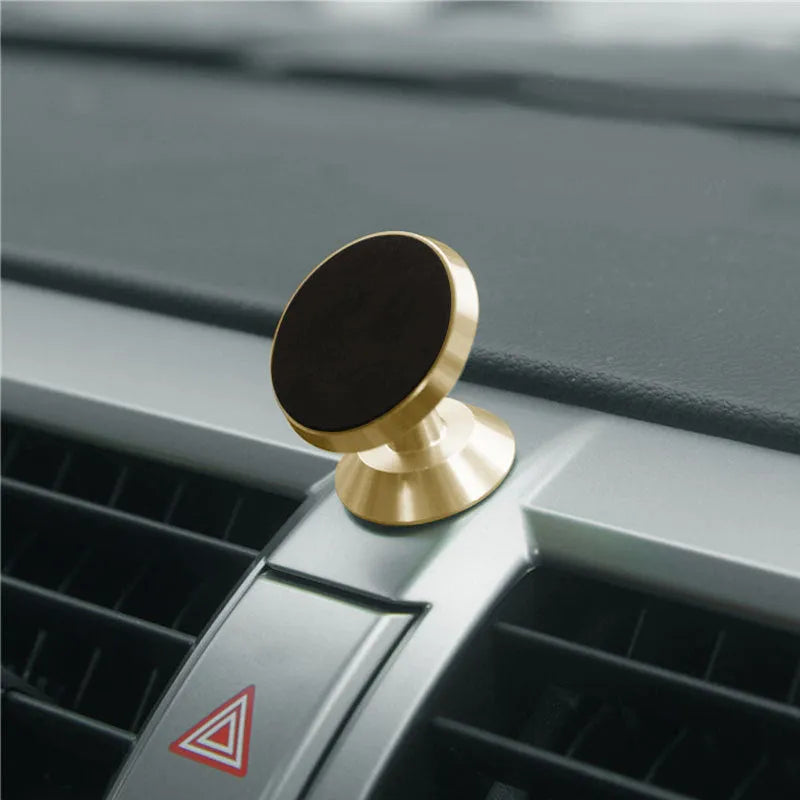 Universal magnetic car phone holder in black silver and gold colours for smartphone mounting