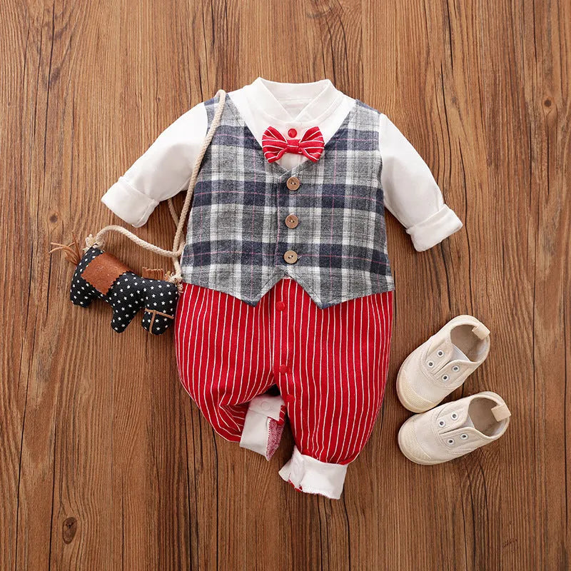 Baby boy wearing a navy blue long-sleeved cotton jumpsuit with gentleman styling.