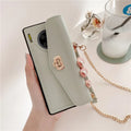 Leather pattern Huawei phone case with diagonal gold chain in pink, black, green, or grey colours
