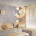 Adjustable aluminium wire star moon chandelier with zinc alloy and iron frame, showing warm light illumination.
