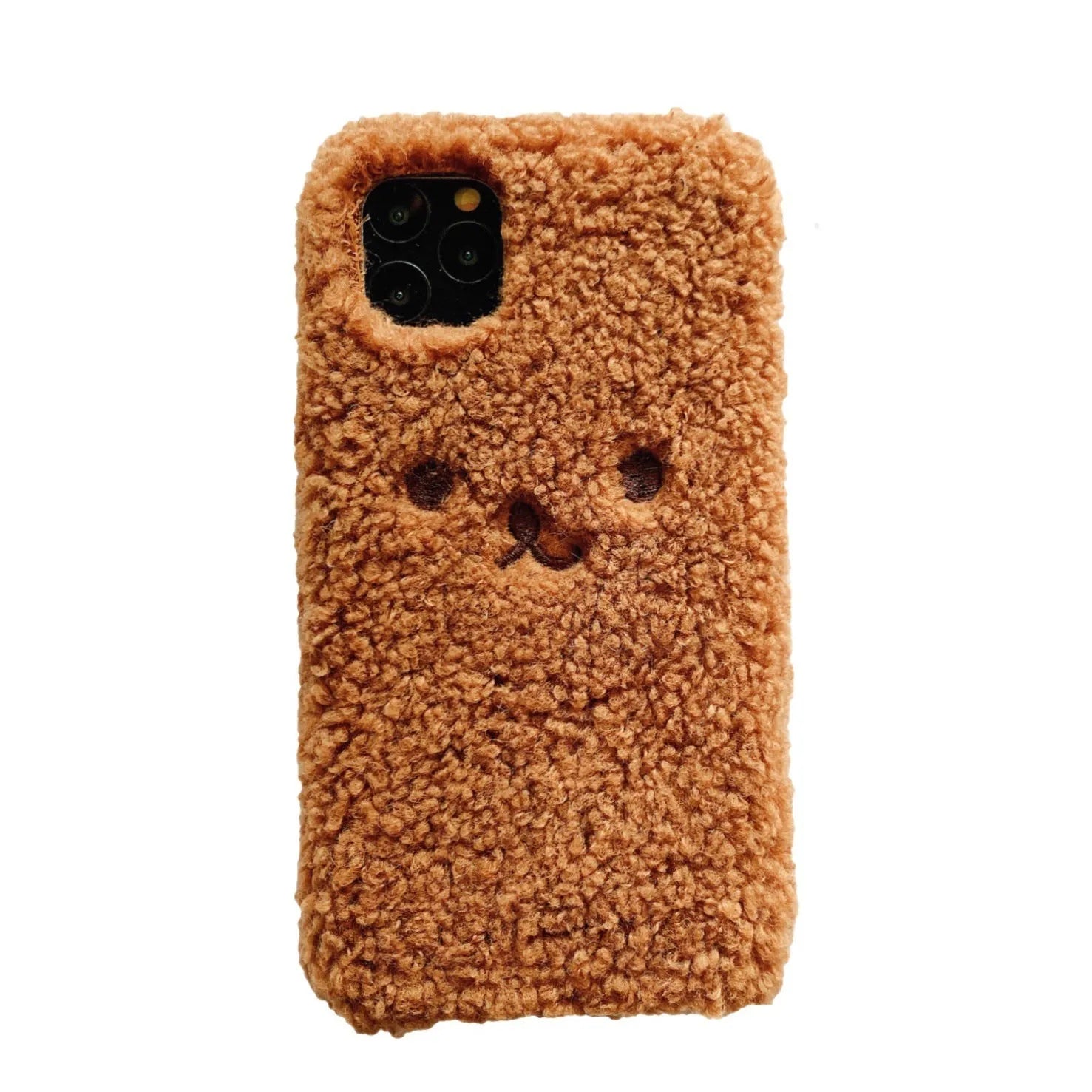 Brown plush embroidered cartoon bear face on a white TPU iPhone case for iPhone 11.