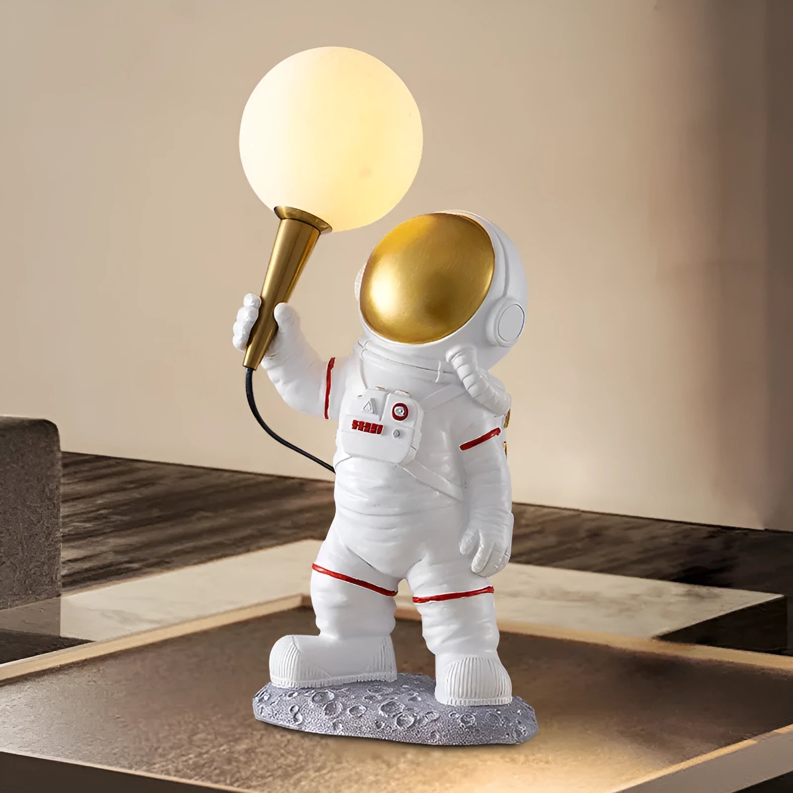 White astronaut desk lamp and children's night light in seated, standing, or wall-mounted style options.